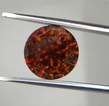 Load image into Gallery viewer, Volcamond: The 5.02 ct Fancy Deep Reddish Orange Diamond That Dazzles Like Fire