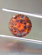Load image into Gallery viewer, Volcamond: The 5.02 ct Fancy Deep Reddish Orange Diamond That Dazzles Like Fire