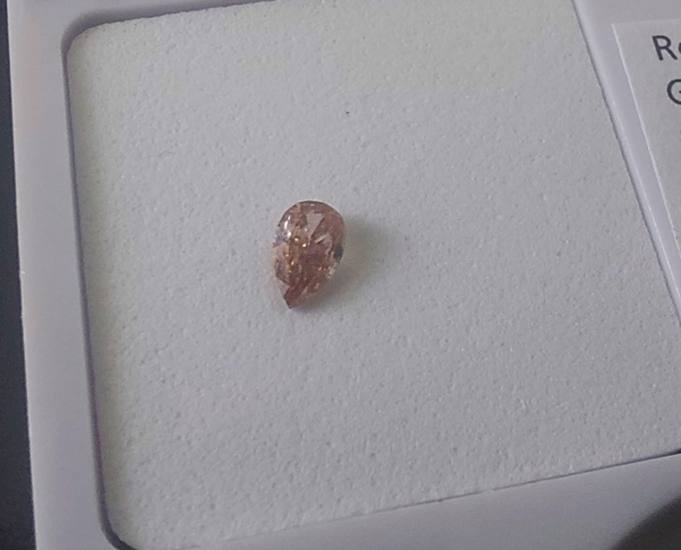 0.13ct Fancy Light Pink Diamond Pear SI1